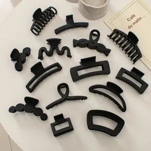 Matte black claw clip set for women with various geometric and minimalist hair clip designs