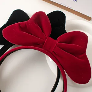 Elegant red and black velvet bow headbands for women featuring vintage style and soft texture