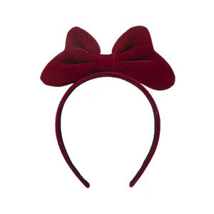Elegant red velvet headband with a large bow for girls, stylish hair accessory for parties