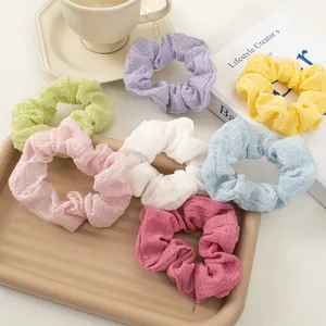 7-piece seersucker scrunchie set in assorted pastel macaron colors with textured fabric