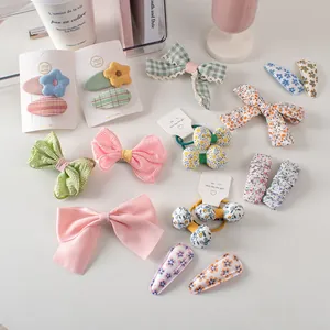 Set di fermagli per capelli per bambine con fiocchi a fiori e motivi a quadretti