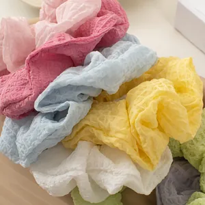 Seersucker scrunchies in pastel macaron colors for cute bun hairstyle accessories