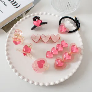 Lot de pinces à cheveux cœur rose comprenant des griffes jelly et un élastique