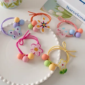 5Pcs set of candy colored floral hair ties with cute cartoon charms for girls