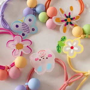 Sweet candy-colored flower hair ties set with cartoon acrylic charms in macaron tones