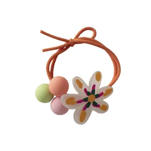 Sweet candy-colored flower hair tie with colorful matte beads and acrylic floral pendant