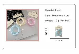 Detailed view of macaron-colored spiral hair ties in plastic with clear packaging cards