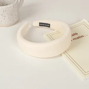 Creamy white waffle texture padded headband with hand made label for high top volume
