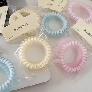 Set de gomas para el pelo en espiral de colores pastel mate con embalaje individual