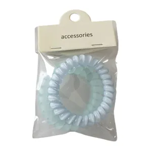 Pack de 2 gomas de pelo en espiral color azul y verde con etiqueta de cartón