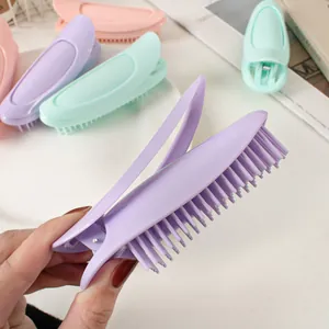 Hair root volumizing clips in pastel purple, green, and pink for a fluffy hairstyle