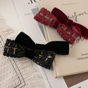Vintage velvet bow hair clips in wine red and black tweed with elegant gold stitching