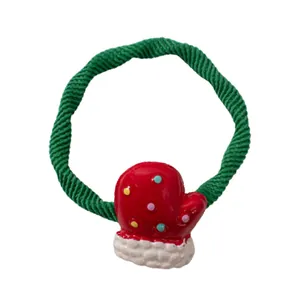 Elastic Christmas scrunchie with a red and white holiday glove charm on green band