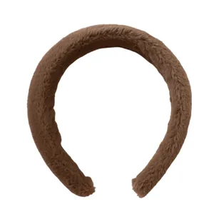 Brown faux rabbit fur headband with wide plush design for a voluminous hair look