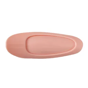 Peach pink hair root clip for high cranial top volume on a clean white background