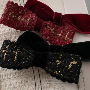 Retro velvet and tweed double bow hair clips in black and wine red with gold thread details