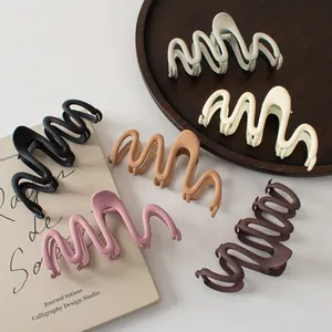 Matte wavy shark hair clips in assorted Morandi colors for elegant hairstyle styling