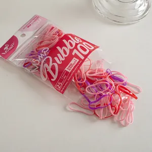 Macro detail of 100 colorful high-elasticity hair bands in 25mm PU material
