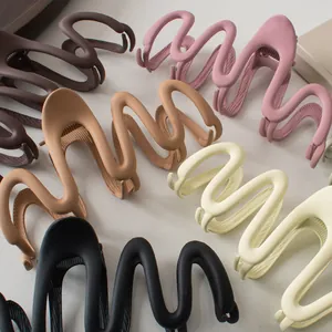 Matte finish wavy hair claw clips in assorted Morandi colors for modern hairstyling