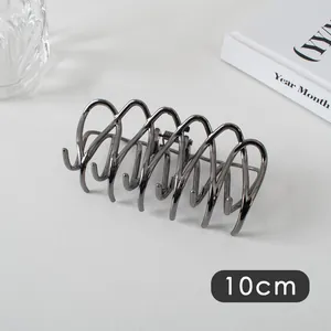 Detail view of 10cm large gunmetal hair claw clip with U-shaped hollow design