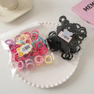 Colorful high elasticity hair bands and basic black hair ties in transparent bags