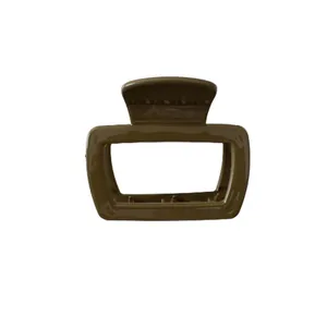 Minimalist square dark brown hair claw clip with glossy finish and rectangular hollow design