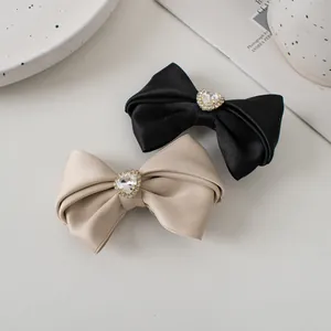 French vintage satin bow hair clips with heart-shaped rhinestones in black and beige
