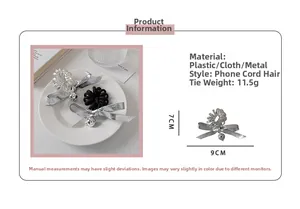 Détail des chouchous nœud argent et noir avec dimensions et poids de 11,5g