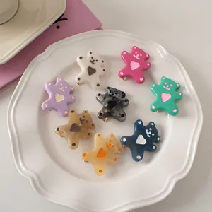 Cute set of 8 resin cartoon bear hair clips with heart accents in various colors