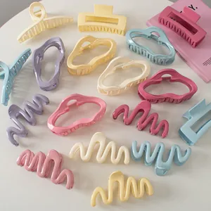 Colorful macaron wavy shark hair clips set in various shapes and glossy finishes
