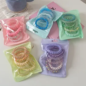6er-Pack florale Spiral-Haargummis in verschiedenen Macaron-Farben mit Mustern