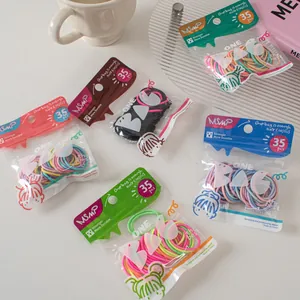 Close-up of candy color high elastic hair bands set with 35 pieces in a bag packaging