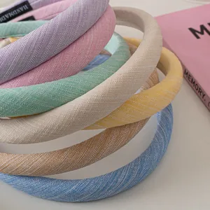 Padded macaron fabric headbands with handmade label in assorted pastel colors