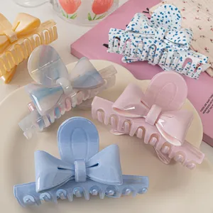 Pinces à cheveux nœud colorées, motifs marbrés et logo France Handmade pour femmes