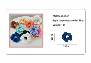 Detail view of 13cm oversized cotton scrunchie showing fabric texture and weight info