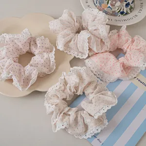 Chiffon polka dot hair scrunchies with white lace trim in pastel colors for women