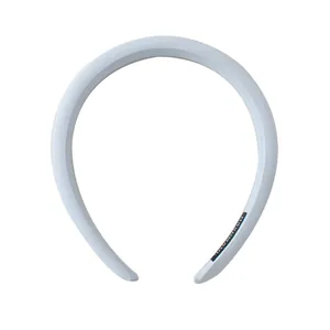 Handmade padded sponge headband in pale blue with a stylish thickened top design