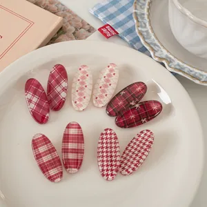 Set of 10 red and pink plaid oval hair clips with sweet retro academic style patterns