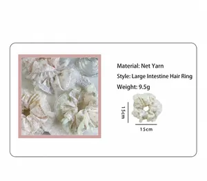 Floral print mesh scrunchie detail with bow pattern, 15cm size and 9.5g weight info