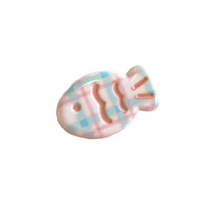 Cute pink and blue checkered fish hair clip for women with detailed 3D resin texture