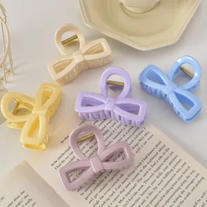 Lot de cinq pinces à cheveux noeud mat aux couleurs pastel pour des coiffures élégantes