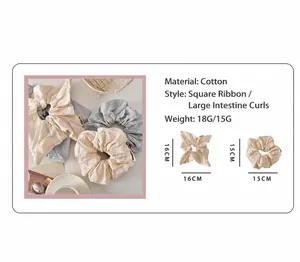 Detail of embroidered floral cotton hair scrunchies showing size and weight specifications