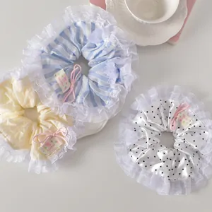 Lot de trois chouchous en dentelle de style coréen aux tons pastels avec nœuds faits main