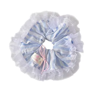 Chouchou en dentelle à rayures bleues avec nœud rose pour coiffures de chignon