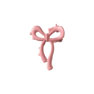Elegante pinza per capelli a fiocco rosa opaco per un’acconciatura sofisticata