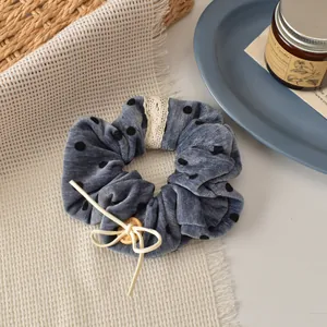 Blue velvet polka dot scrunchie with lace detail and handmade wood button accessory