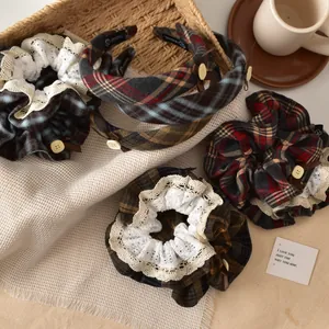 Close-up of vintage plaid hairband set with lace details and elegant wooden buttons