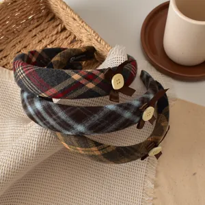 Three-piece retro plaid headband set with lace edges, bows, and decorative buttons