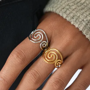 Minimalist gold and silver stainless steel swirl rings for women in open spiral design