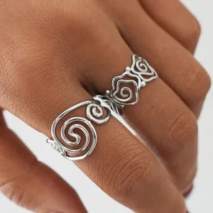 Elegant silver stainless steel ring set with double spiral design and rose pattern details